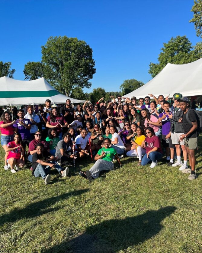 Fraternity and Sorority Members posing as a group