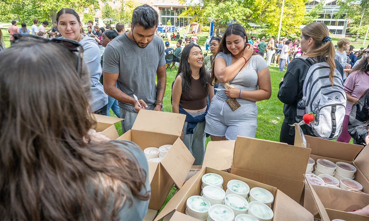Students tabling and awaiting ice cream