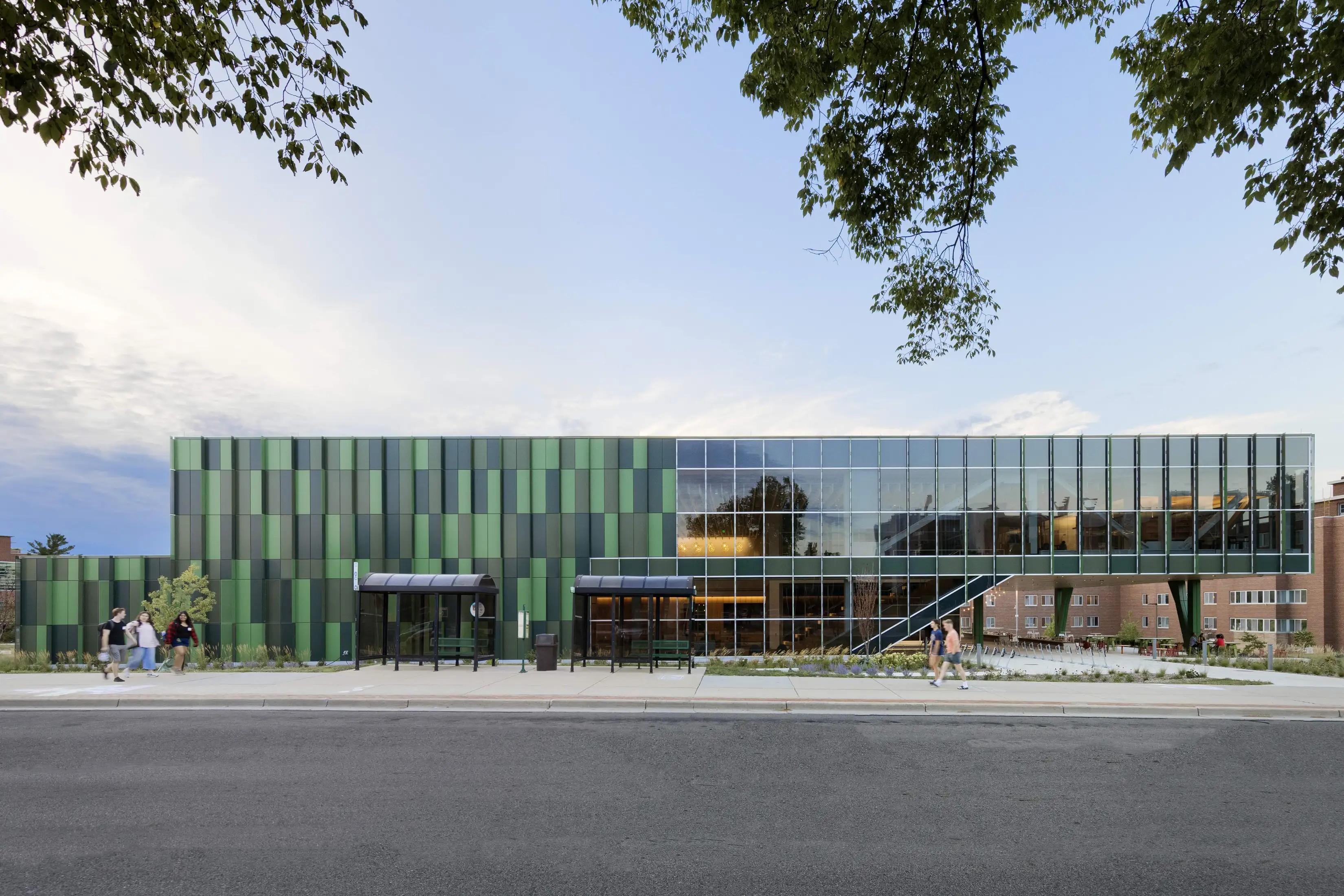 The Multicultural Center’s facade with students walking by