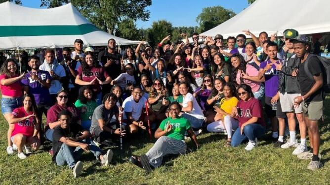 Fraternity and Sorority Members posing as a group