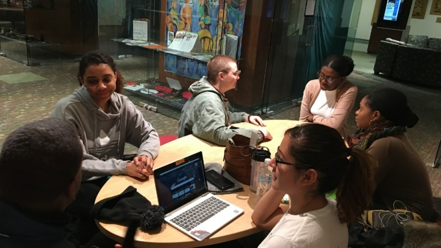 Students studying at a table